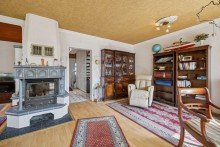 Wohnzimmer mit Kamin *** Gro�er Walmdachbungalow auf tollem Grundst�ck in Henstedt-Ulzburg***
