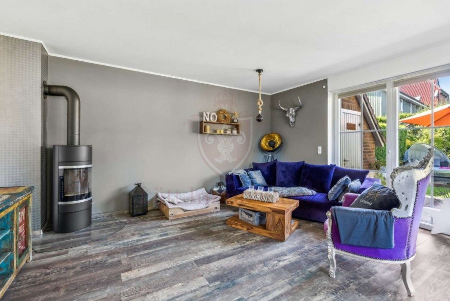 Wohnbereich mit Kamin Doppelhaush�lfte Wakendorf II